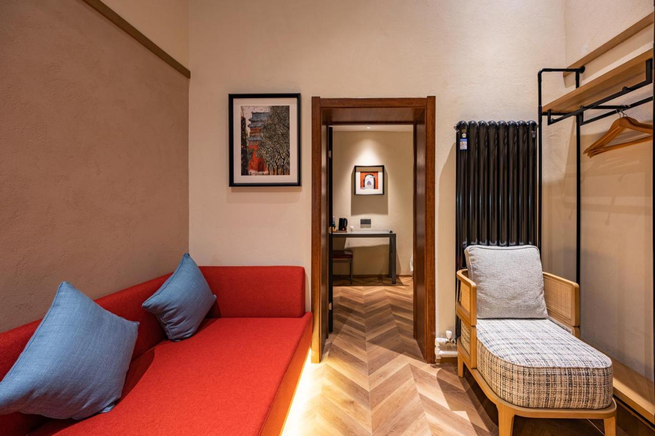 Qiuguo Hutong Courtyard Hotel Pekín Exterior foto