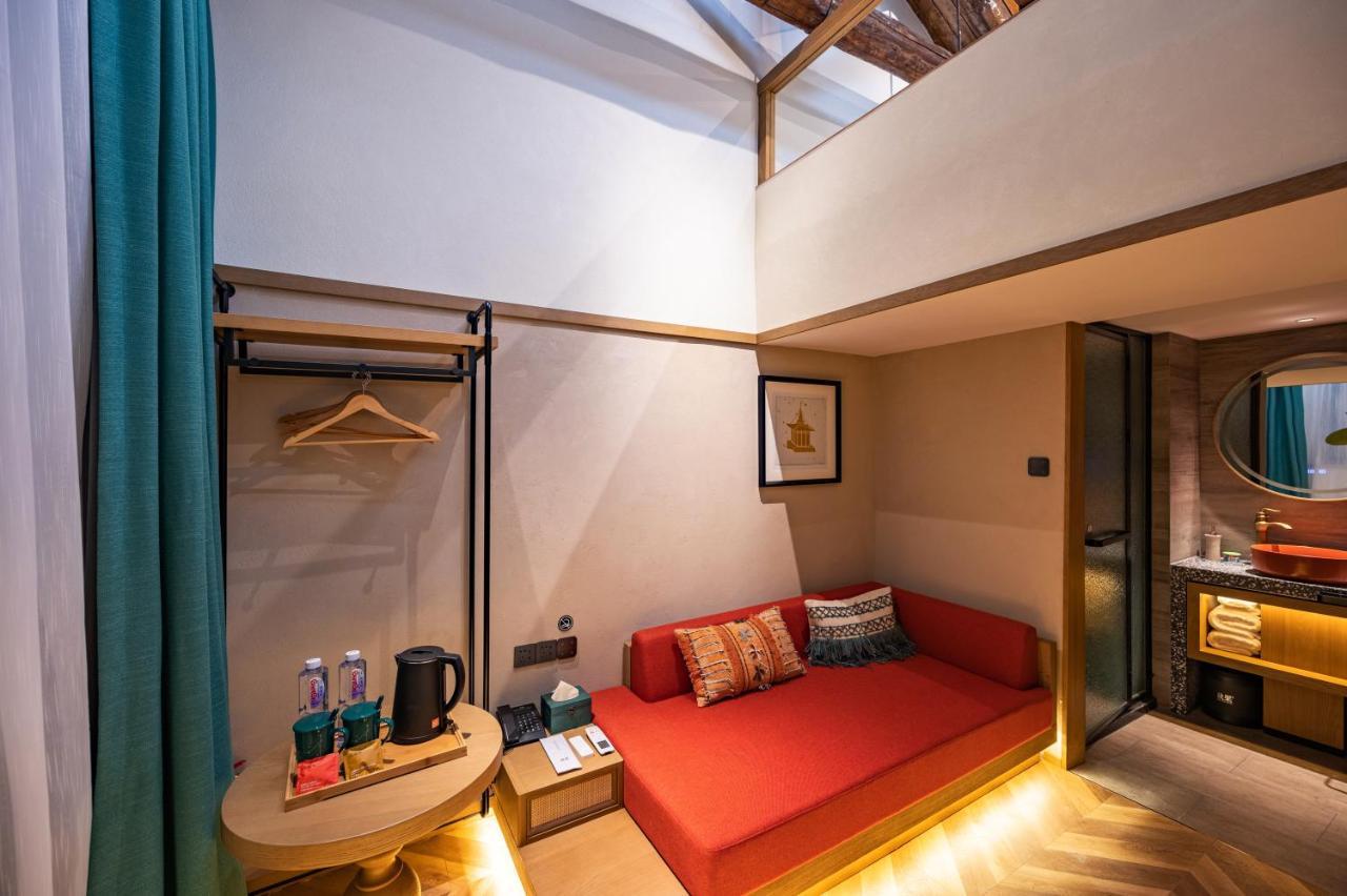 Qiuguo Hutong Courtyard Hotel Pekín Exterior foto