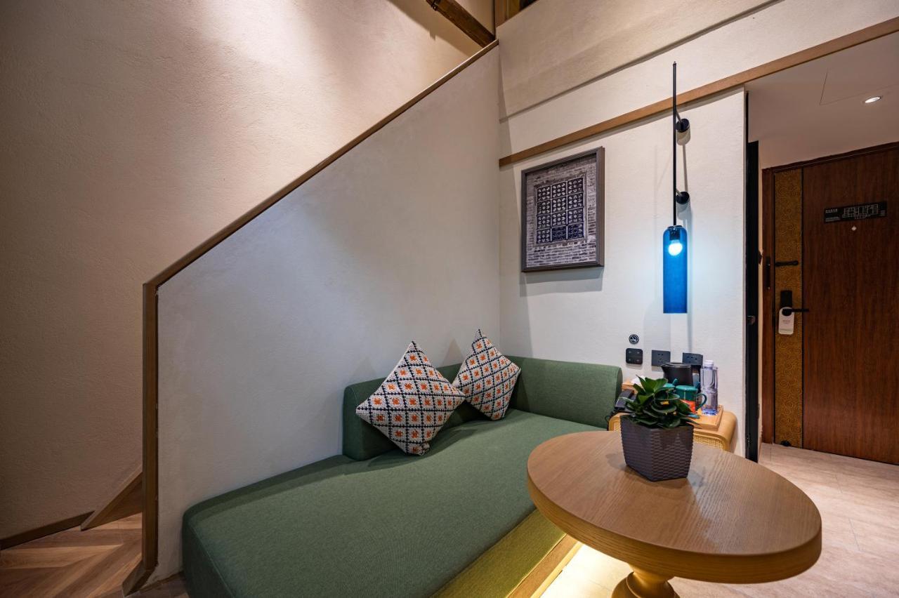 Qiuguo Hutong Courtyard Hotel Pekín Exterior foto