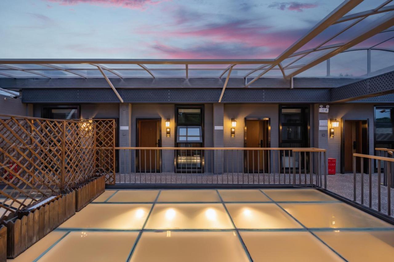 Qiuguo Hutong Courtyard Hotel Pekín Exterior foto