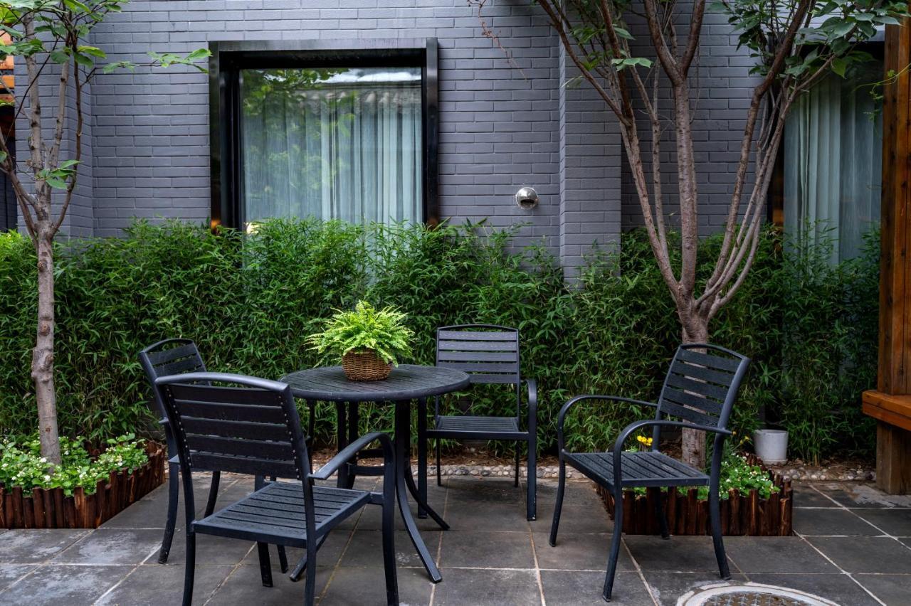 Qiuguo Hutong Courtyard Hotel Pekín Exterior foto
